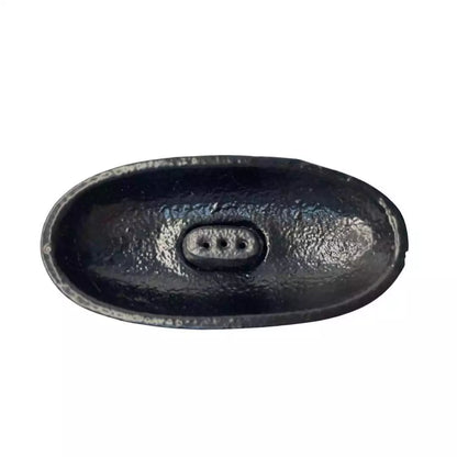 Black oval cast iron cauldron dish with smooth interior and raised rim — 4-inch ritual incense burner for altar work.