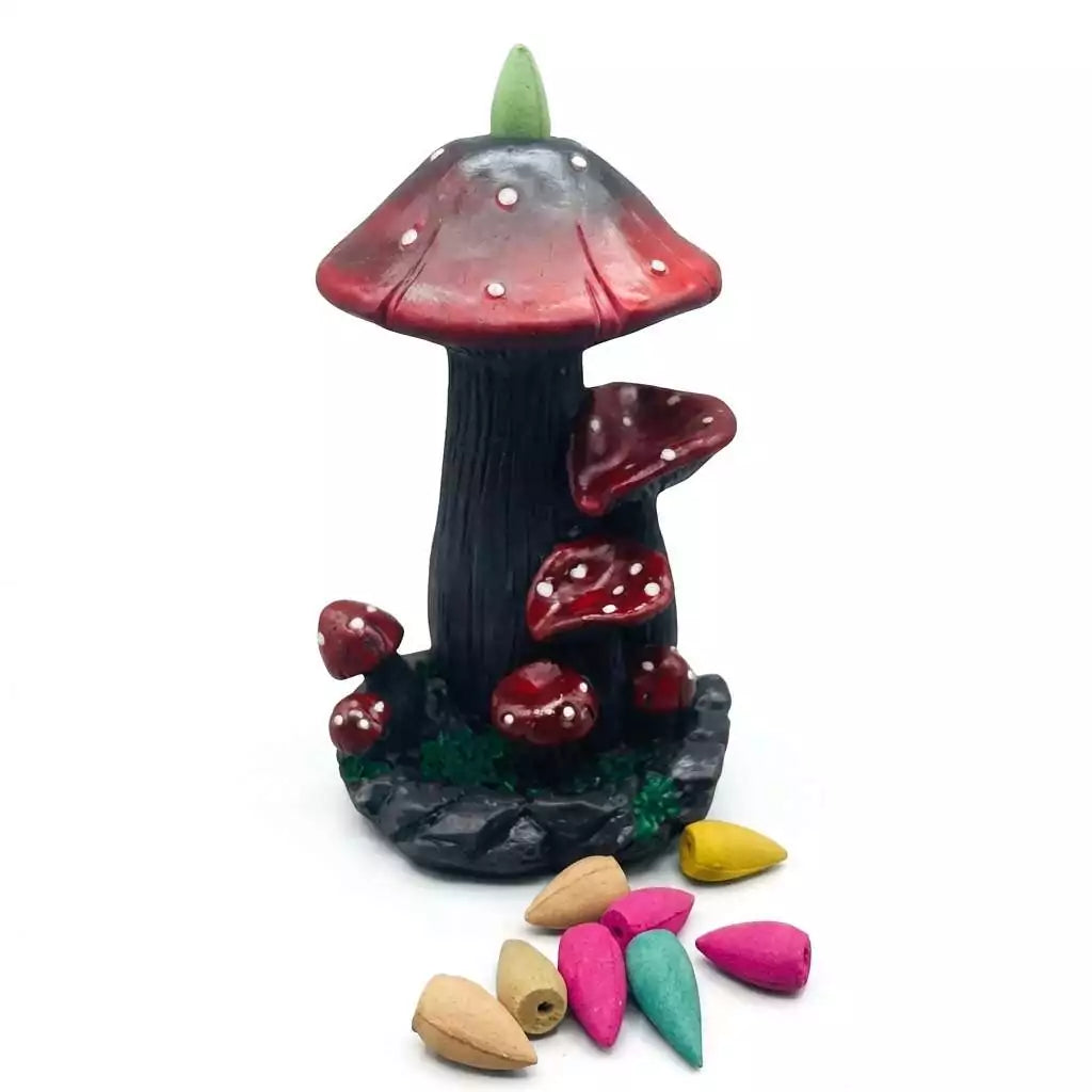 Seven-inch ceramic mushroom backflow incense burner showing the waterfall smoke cascading down the mushroom stem — altar decor piece.