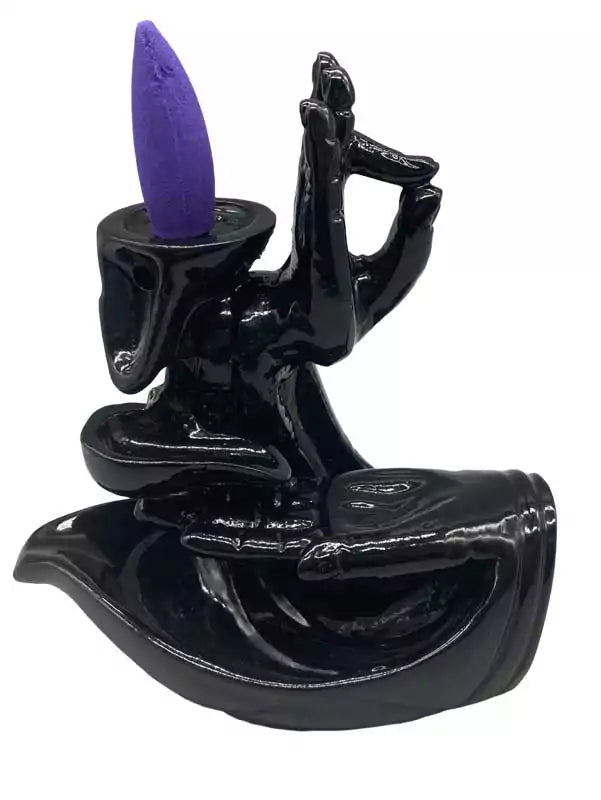 5-inch Hand of Compassion Hamsa-shaped ceramic backflow incense burner — showing cascading waterfall smoke effect for meditation and altar use.
