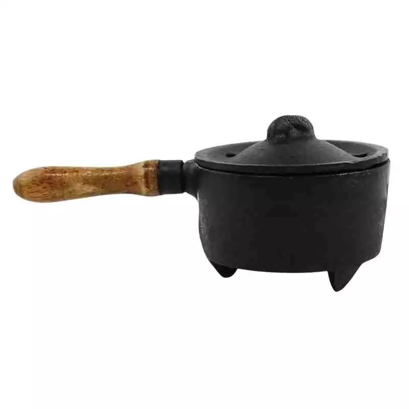 Small cast iron incense burner pot with wooden handle and lid — designed for granular resin and charcoal disc burning.