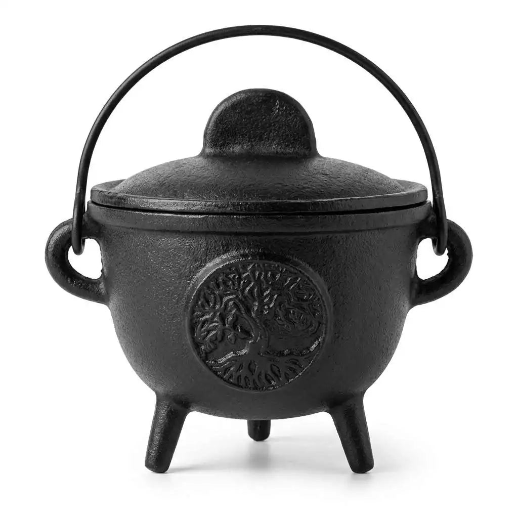 Tree of Life cast iron cauldron with lid and handle — 5-inch black iron cauldron on three legs showing the embossed Tree of Life design on the lid.