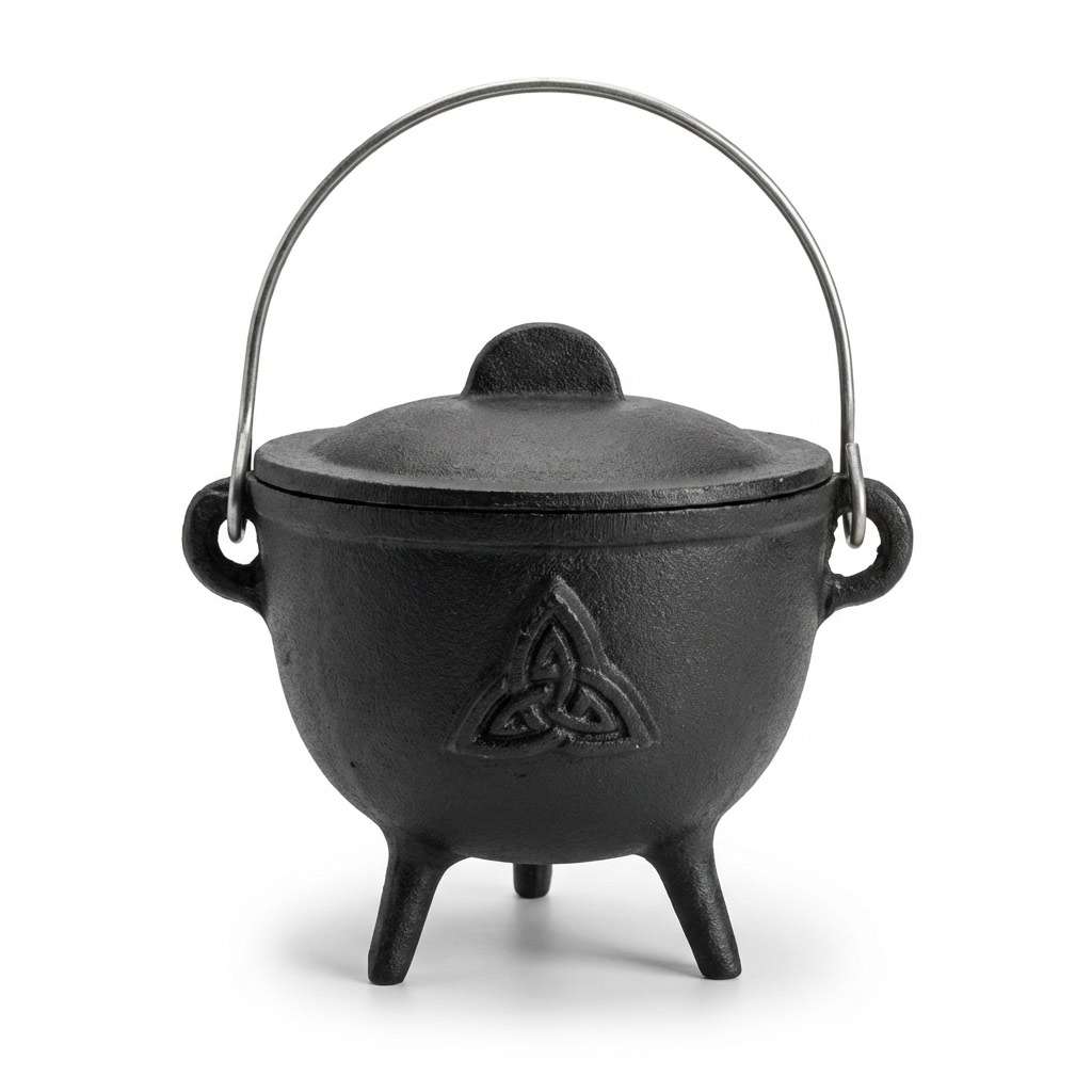 Triquetra cast iron cauldron 4.5 inch with lid — small black iron cauldron with Celtic triple-knot triquetra embossed design and domed lid for altar ritual work.
