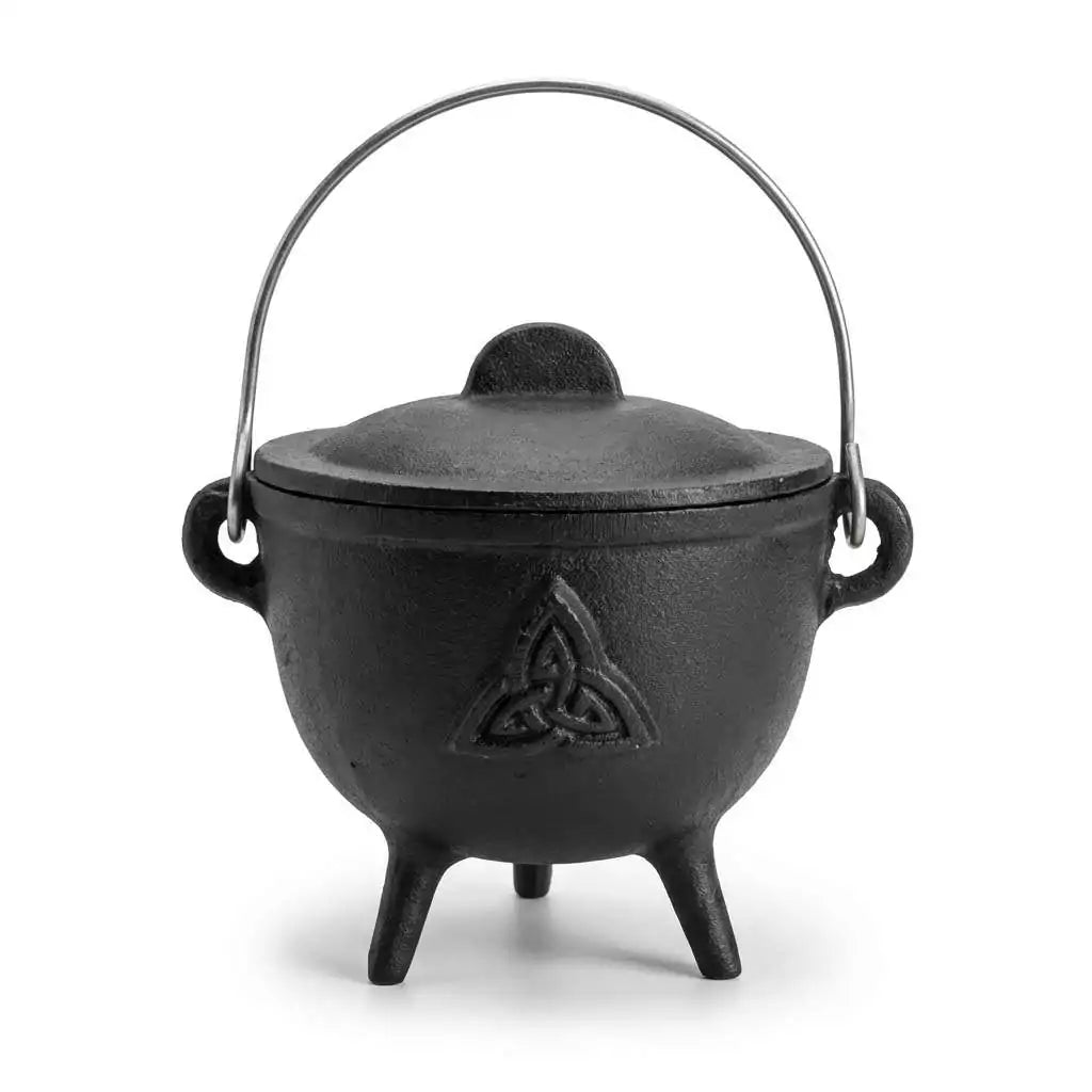 Triquetra cast iron cauldron 4.5 inch with lid — small black iron cauldron with Celtic triple-knot triquetra embossed design and domed lid for altar ritual work.