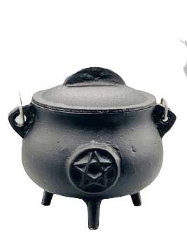 5.5-inch black cast iron pentagram cauldron with lid showing embossed pentagram star on the body — ritual altar tool for Wiccan spell work.