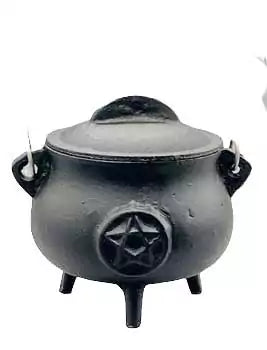 5.5-inch black cast iron pentagram cauldron with lid showing embossed pentagram star on the body — ritual altar tool for Wiccan spell work.