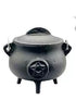 5.5-inch black cast iron pentagram cauldron with lid showing embossed pentagram star on the body — ritual altar tool for Wiccan spell work.