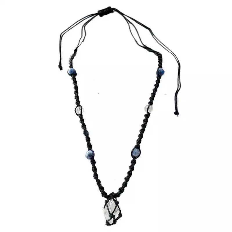 Handmade cord necklace with a central clear and blue sodalite pendant surrounded by beads on a black adjustable cord.