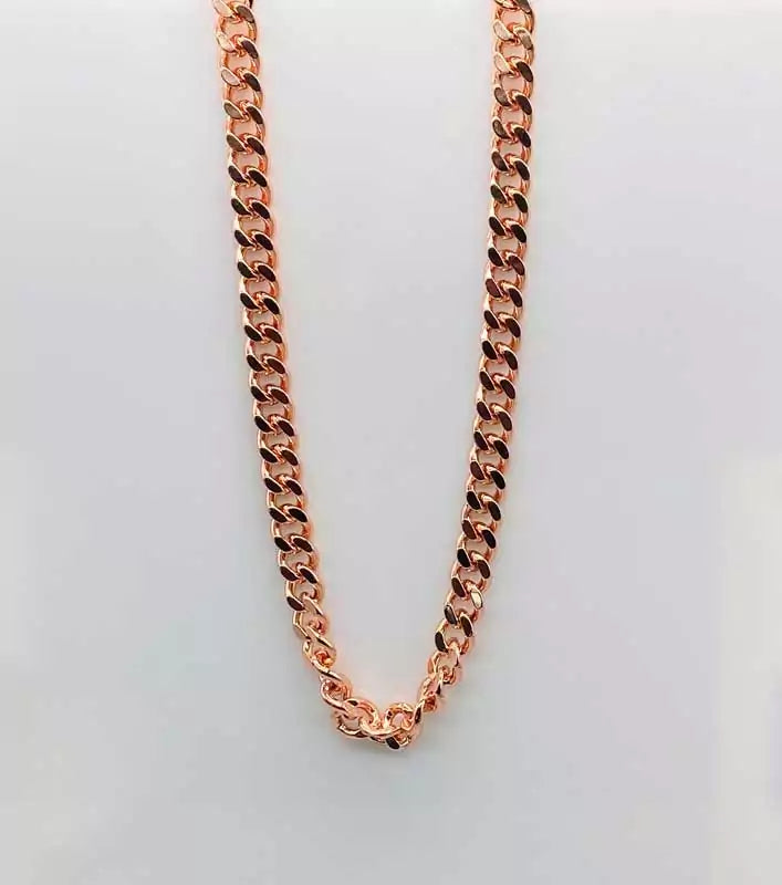 Copper Cuban link chain necklace 24 inch — solid copper interlocking links displayed on a light background showing the bold chain pattern.