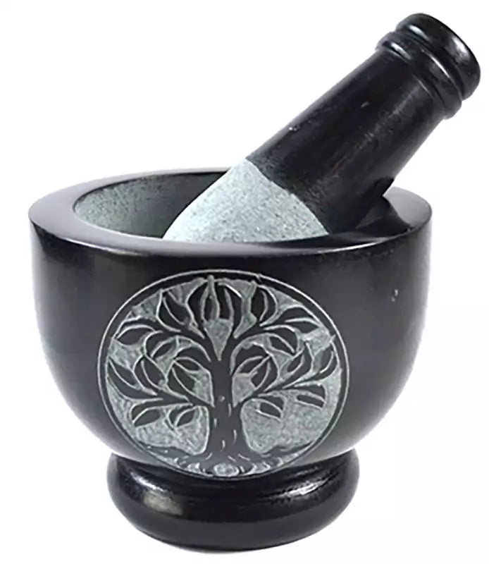 Black soapstone 4-inch mortar and pestle set with an engraved Tree of Life design on the bowl exterior — sacred symbol herb grinding set.
