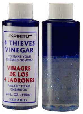 4oz bottle of Espiritu Four Thieves Vinegar with blue label — traditional Vinagre de Los 4 Ladrones hoodoo formula for banishing and protection rituals.