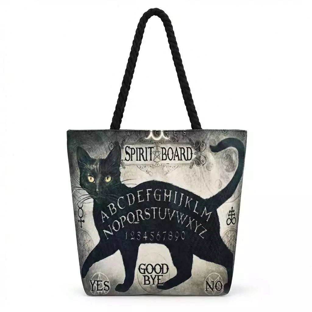 17x17-inch jute tote bag with cat and spirit board planchette occult design and rope handles — witchy carry bag for tarot readers and divination enthusiasts.