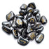 Hematite rune set showing 25 carved Elder Futhark rune stones in polished dark silver hematite displayed with rune symbols facing up.