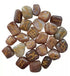 Collection of moonstone rune stones with Elder Futhark symbols carved into polished iridescent surfaces — lunar divination set.