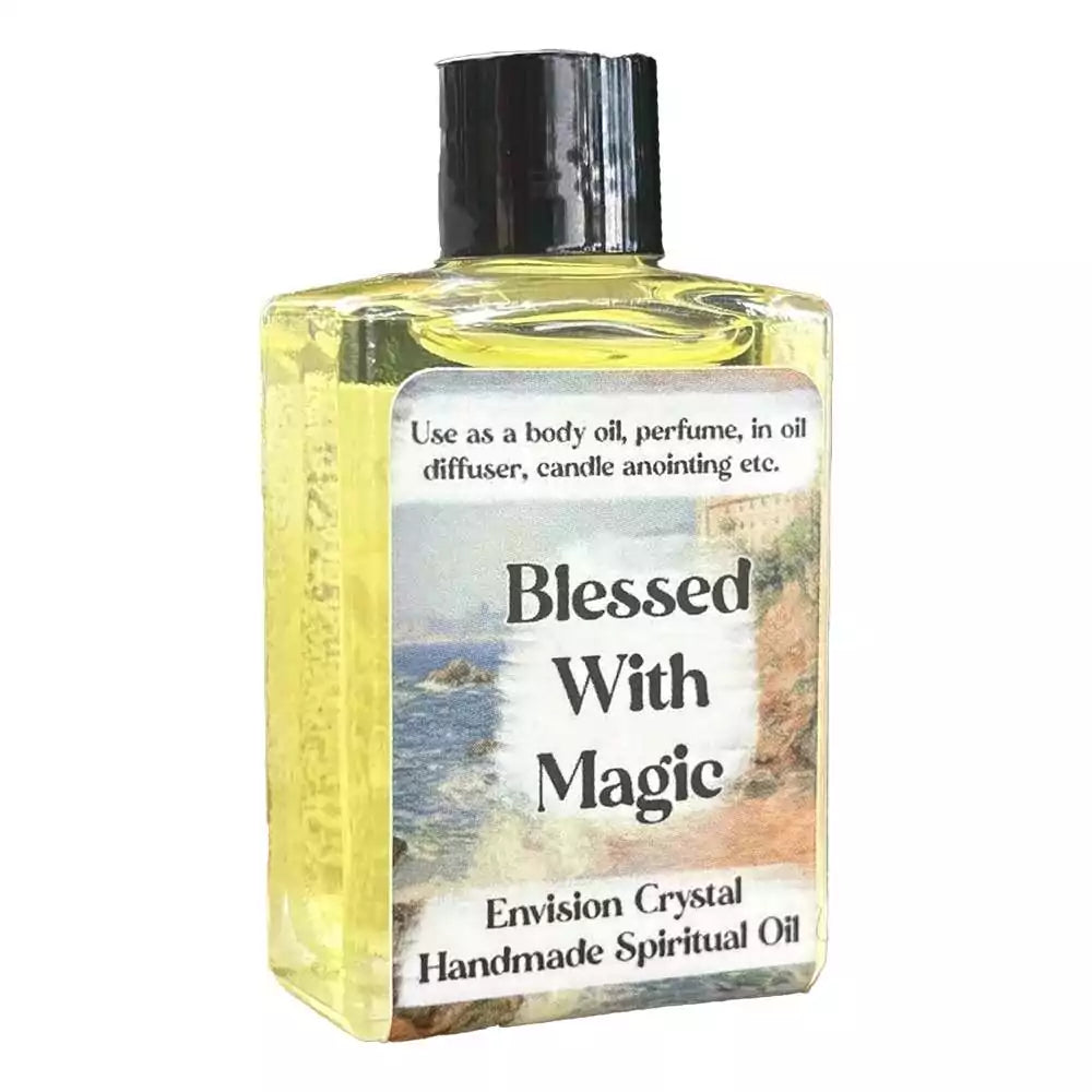 Small yellow oil bottle labeled Blessed With Magic, designed for use as a body oil, perfume, or in an oil diffuser.