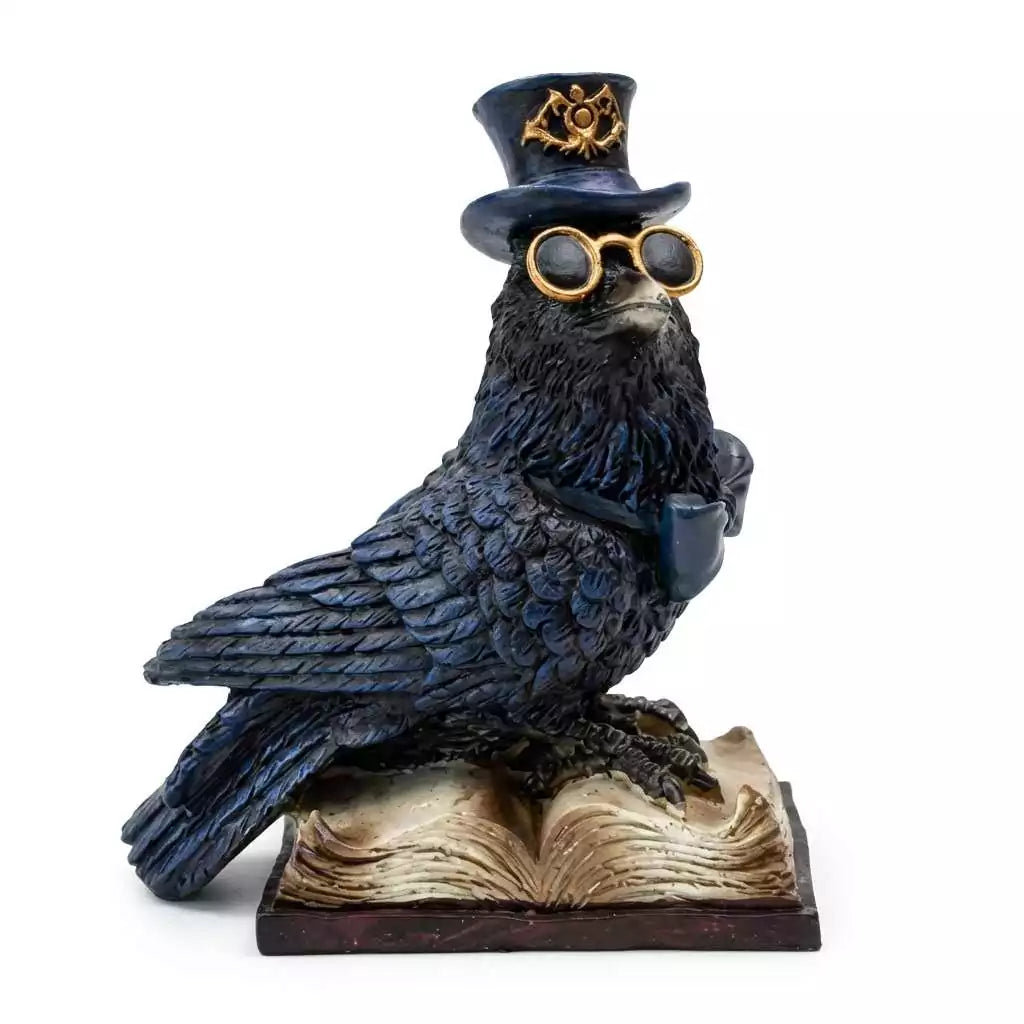 Steampunk-styled cold-cast resin raven figurine perched on a stack of books with gear and clockwork detailing, 4.75 inch gothic altar decor statue.