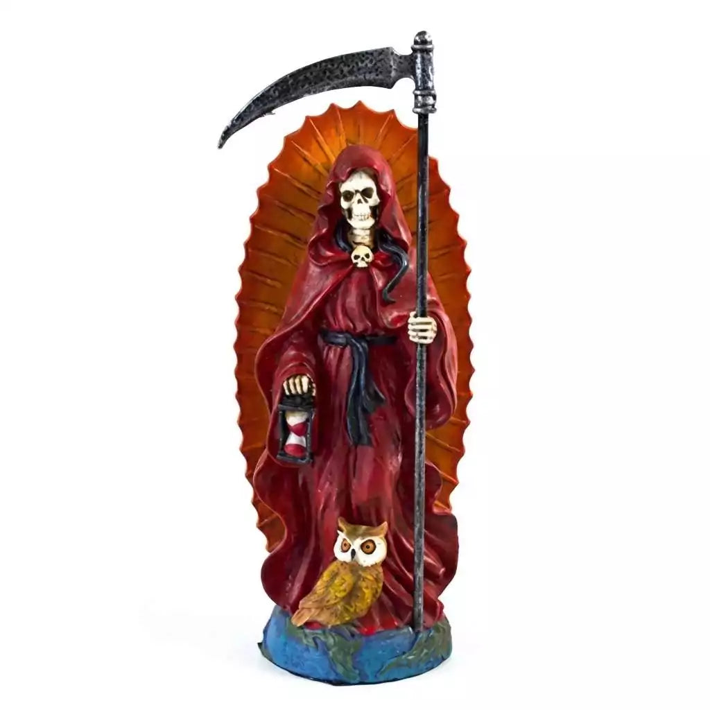 Red Santa Muerte statue showing Holy Death figure in red robes holding scythe and globe for protection and spiritual devotion altar use