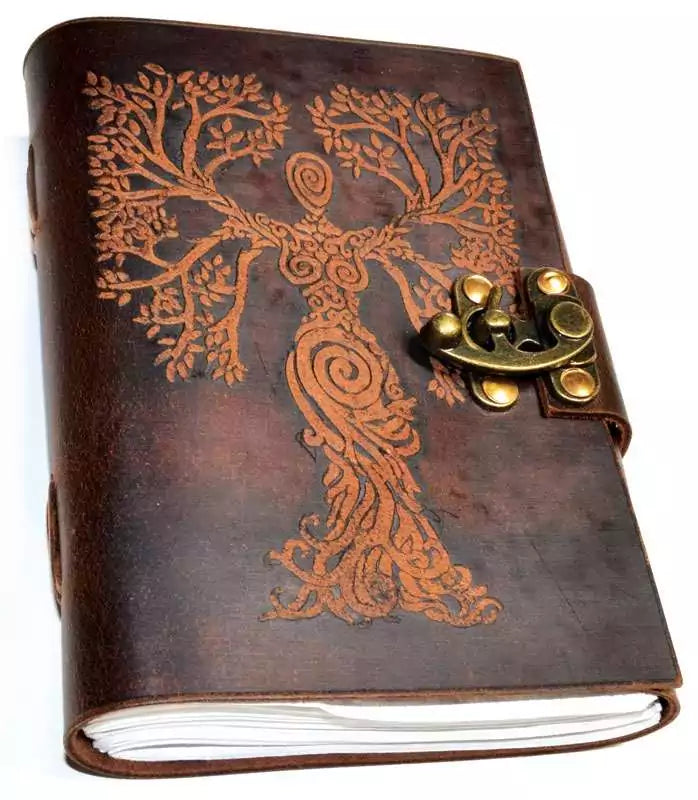 Tree Woman leather journal with latch showing embossed goddess and tree imagery on cover for spiritual journaling and grimoire use