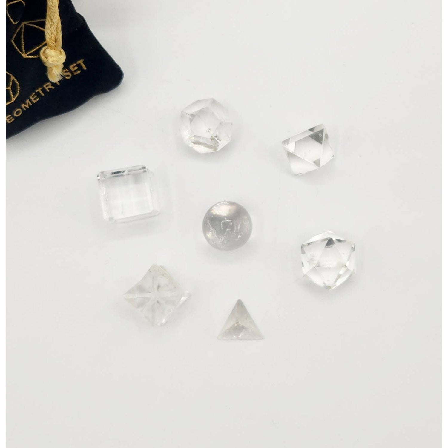 Clear Quartz Sacred Geometry Set – 7 Carved Crystals + Merkaba &amp; Sphere with Grid &amp; Pouch