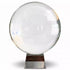 A large 200mm clear crystal ball on a metallic display stand reflecting light and creating visual distortions — an 8-inch polished quartz sphere for scrying, meditation, and altar display.