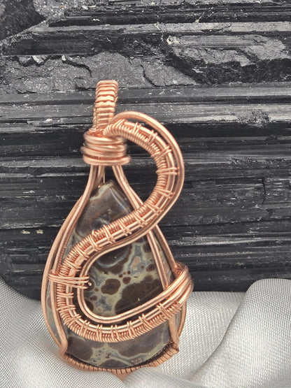 Hand-crafted Wire Wrapped Asteroid Jasper Crystal Pendant