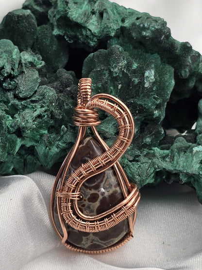 Hand-crafted Wire Wrapped Asteroid Jasper Crystal Pendant