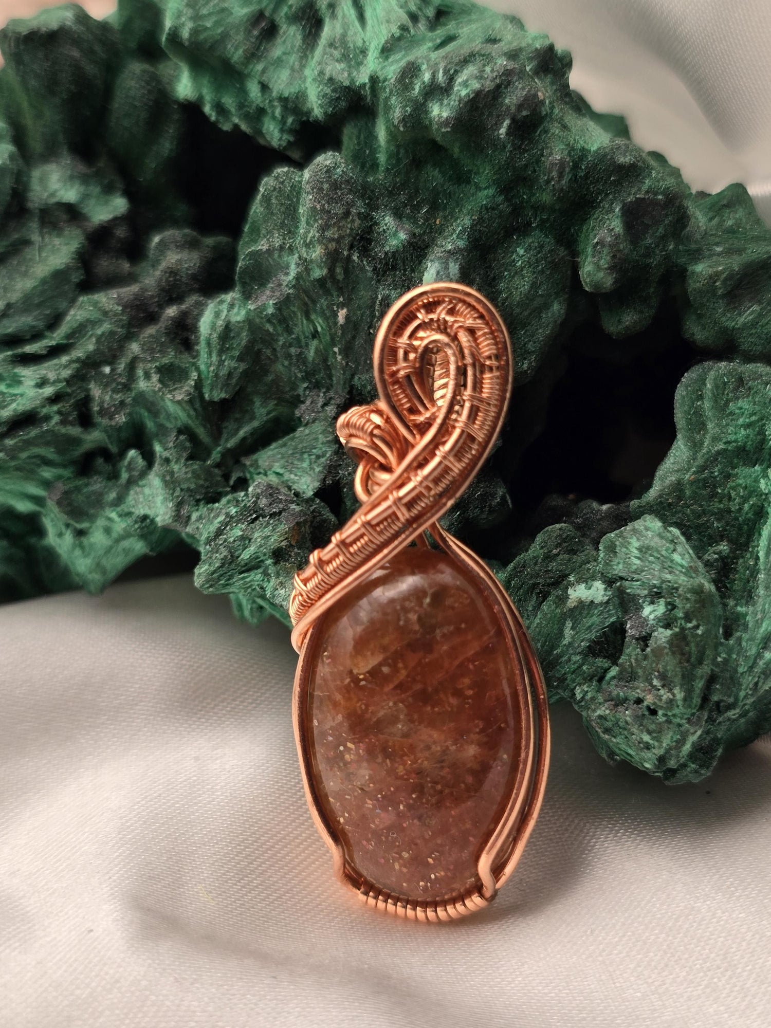 Hand-crafted Wire Wrapped Confetti Sunstone Crystal Pendant