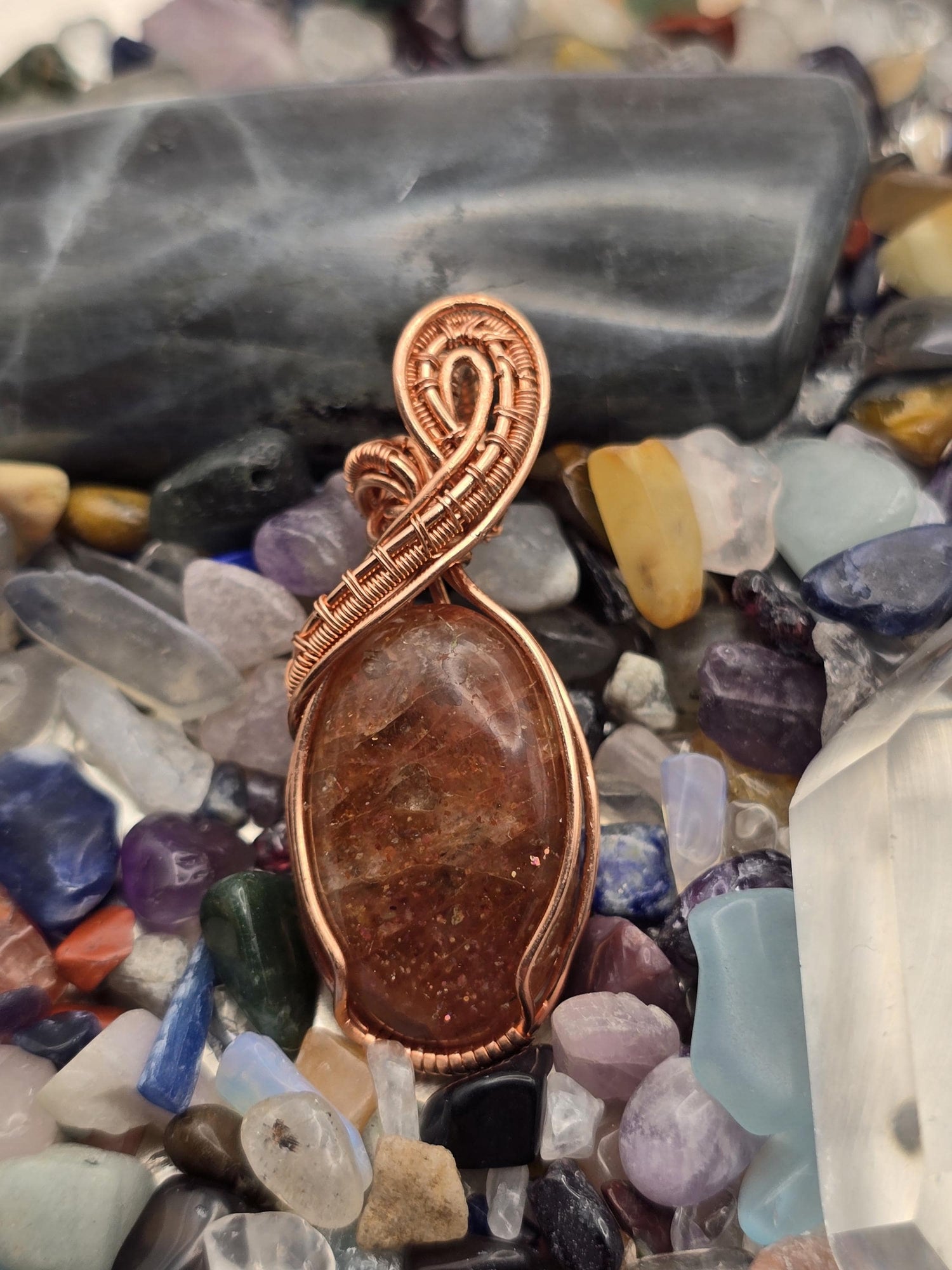 Hand-crafted Wire Wrapped Confetti Sunstone Crystal Pendant