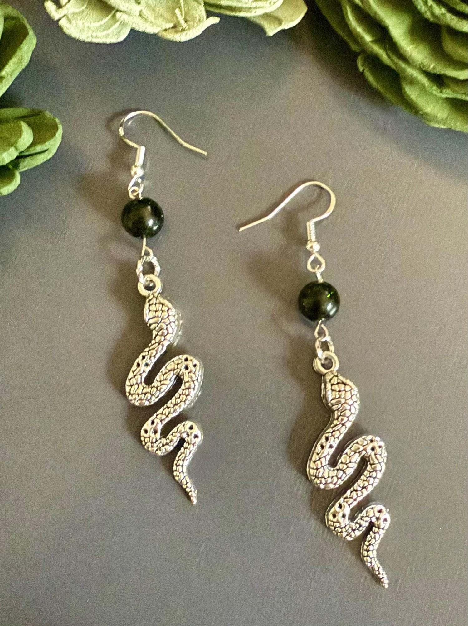 Medusa Silver Serpent Earrings with Shimmery Green Goldstone Gemstone.