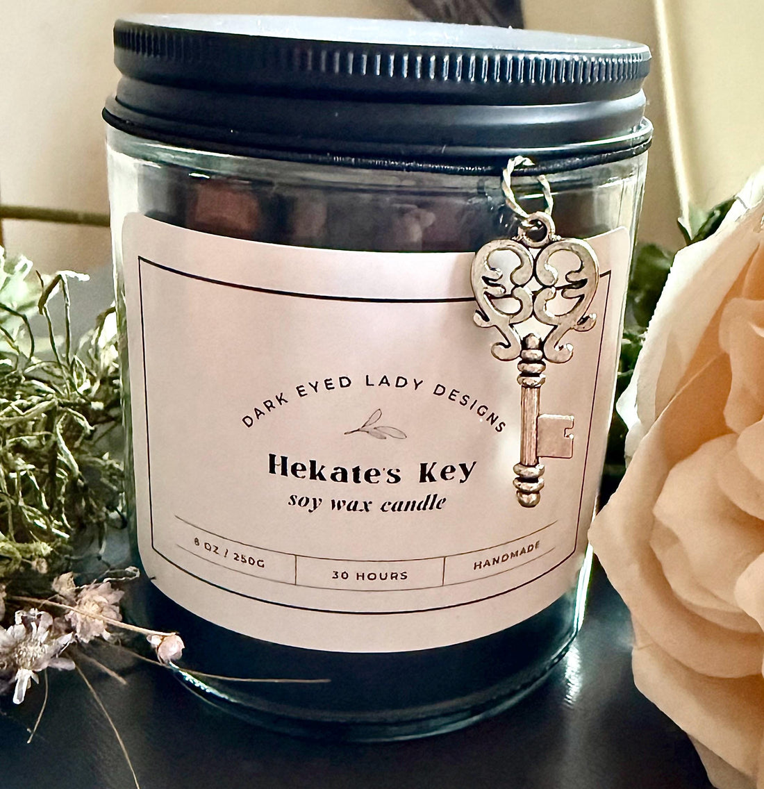Goddess Hekate Black Soy Candle with Key Charm, Herbs, and Amethyst Crystal Chips.