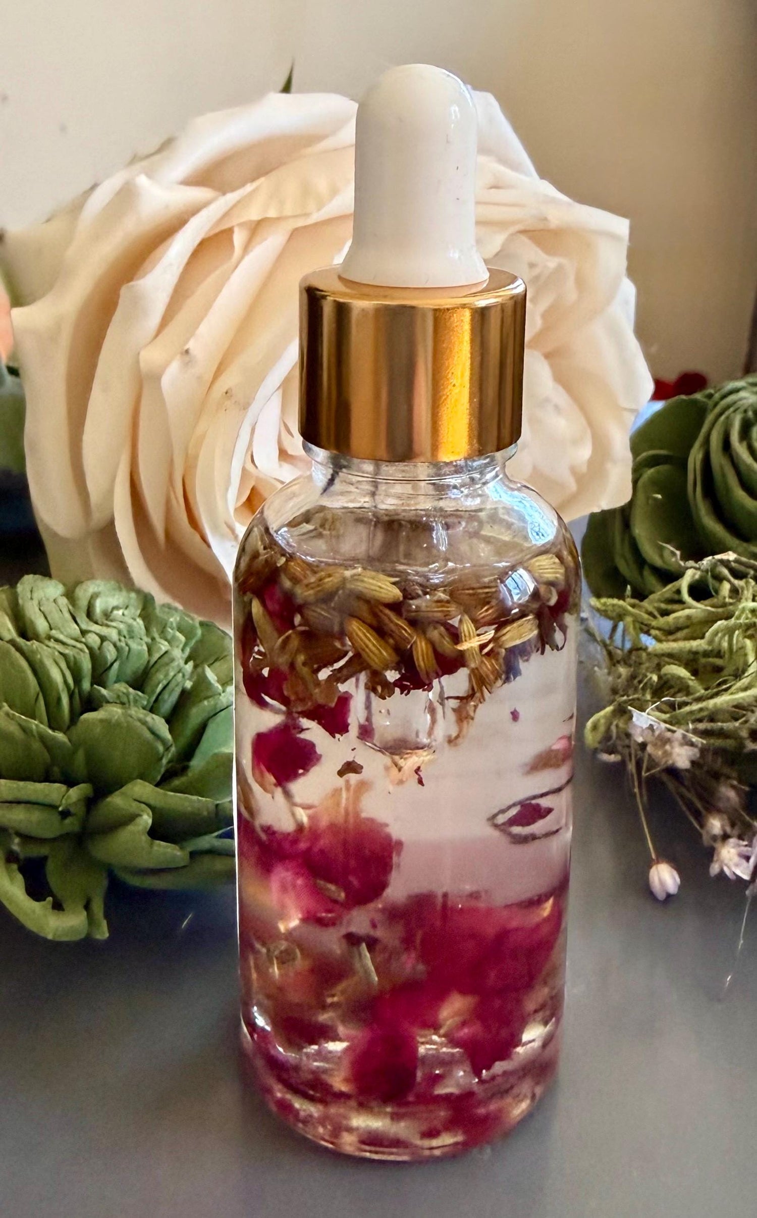 Goddess Invocation Ritual Anointing Oil with Essential Oils, Dried Rose and Lavender Petals.