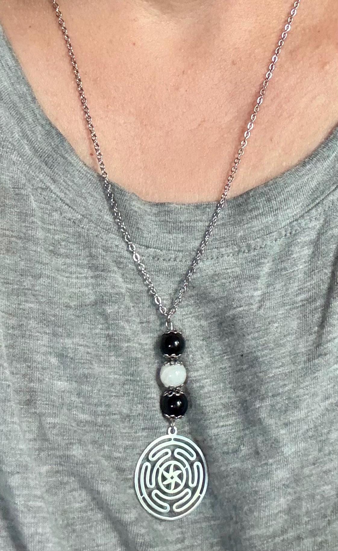 Goddess Hekate’s Wheel Pendant Necklace with Obsidian and Moonstone.