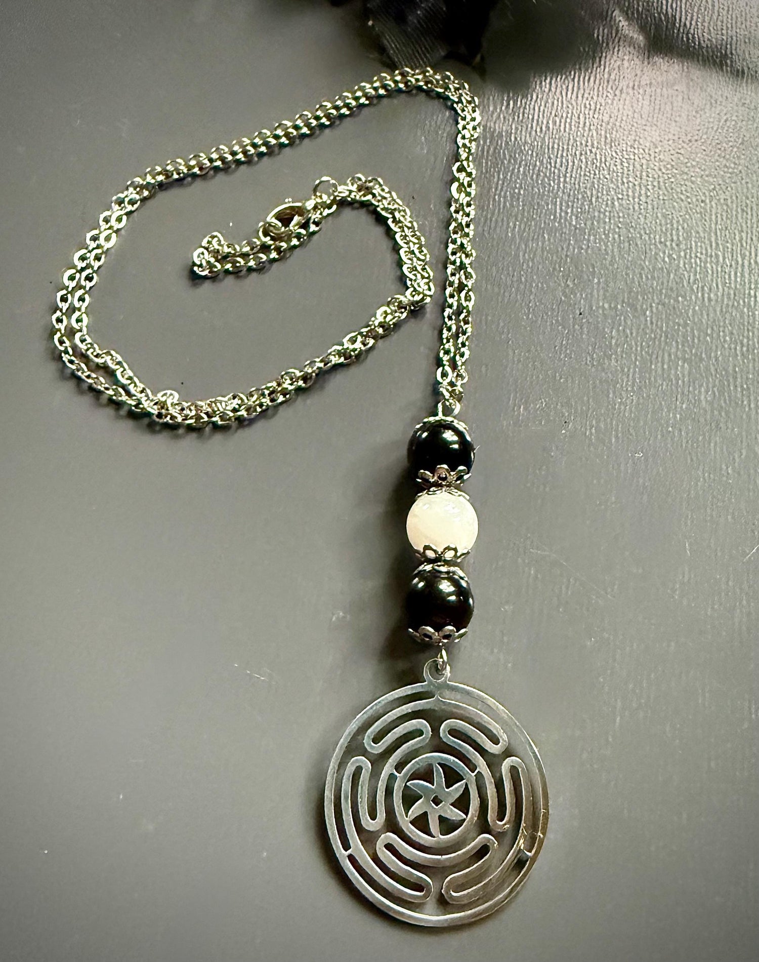 Goddess Hekate’s Wheel Pendant Necklace with Obsidian and Moonstone.