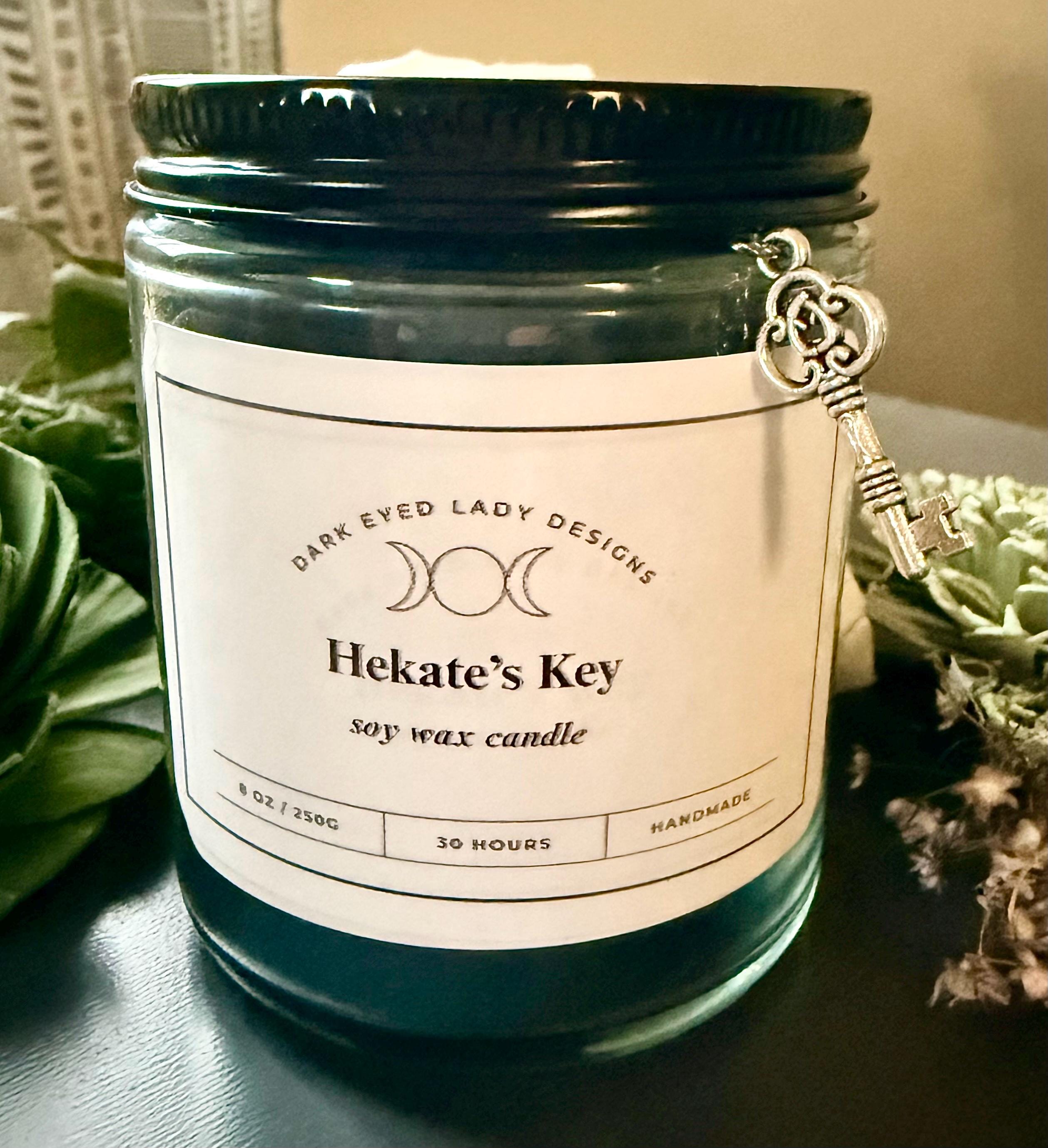 Goddess Hekate Black Soy Candle with Key Charm, Herbs, and Amethyst Crystal Chips.