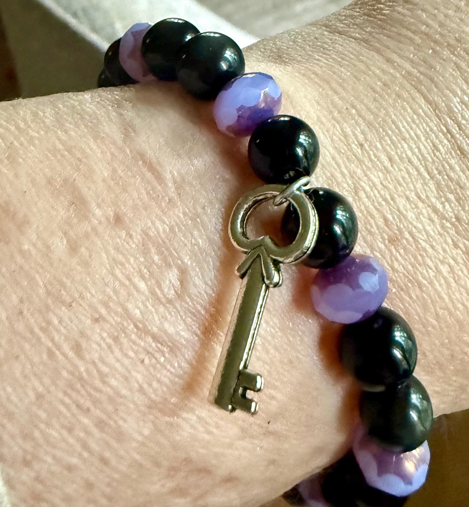 Hekate Bracelet with Black Obsidian Gemstones and Purple Iridescent Glass Beads.