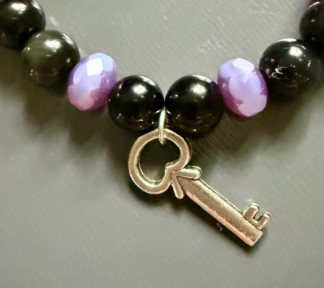 Hekate Bracelet with Black Obsidian Gemstones and Purple Iridescent Glass Beads.