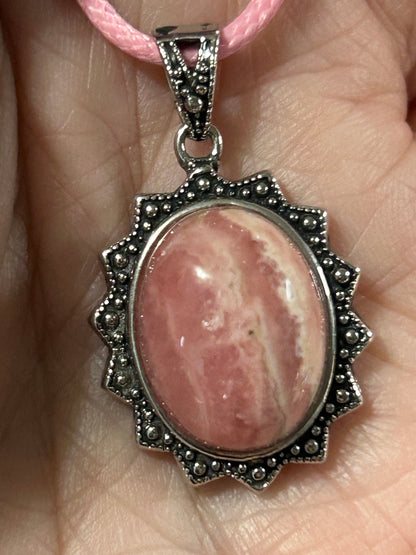 Gorgeous HQ Oval Rhodochrosite Pendant