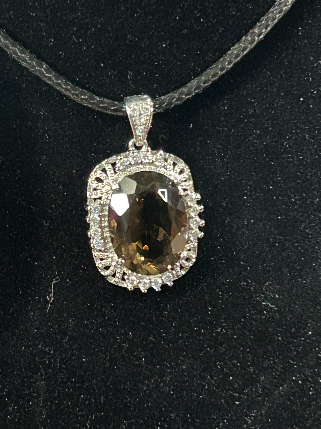Blingy Oval Faceted Smokey Quartz Pendant