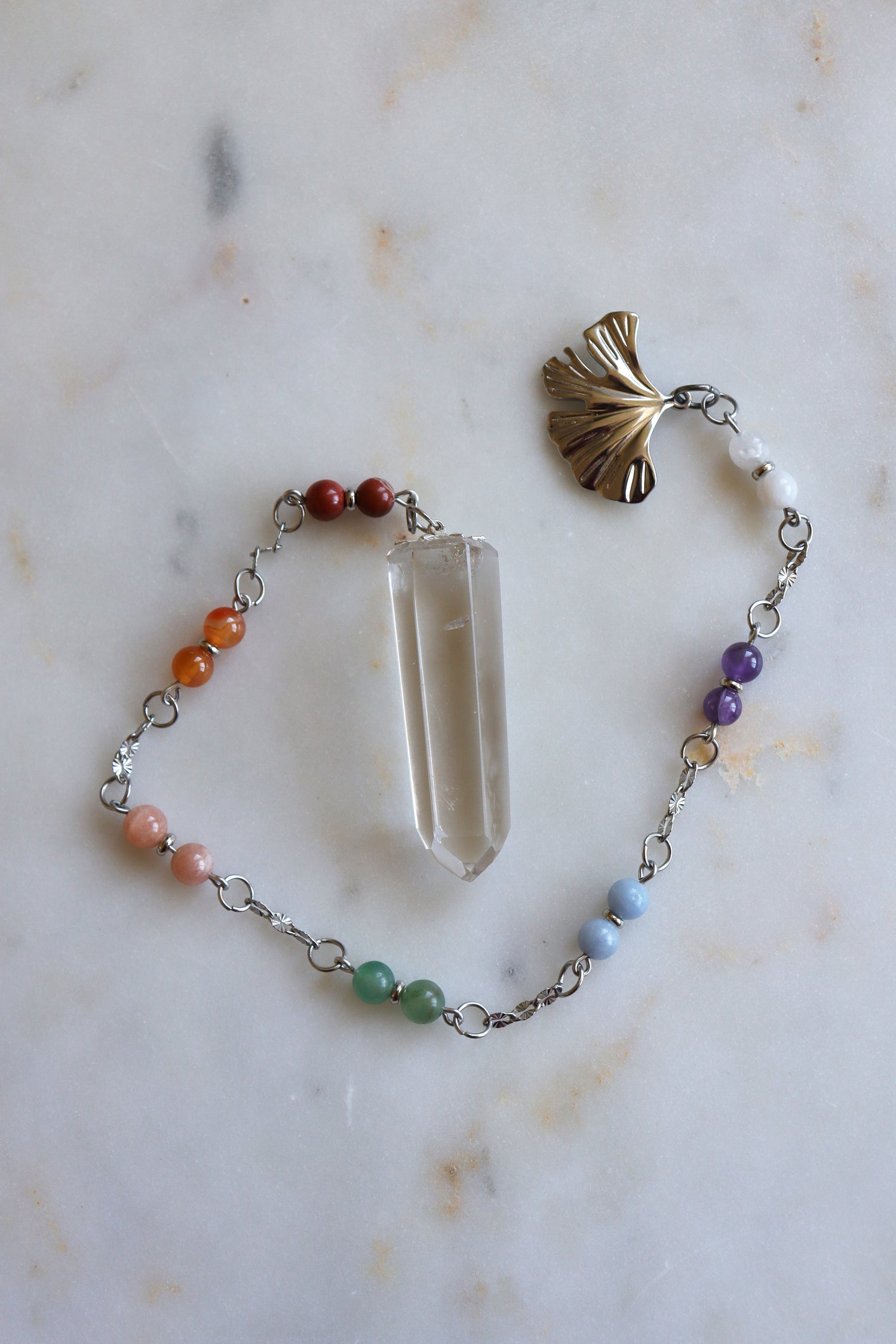 7 Chakra Crystal Pendulum – Clear Quartz Point, Ginkgo Charm, Spiritual Divination Tool