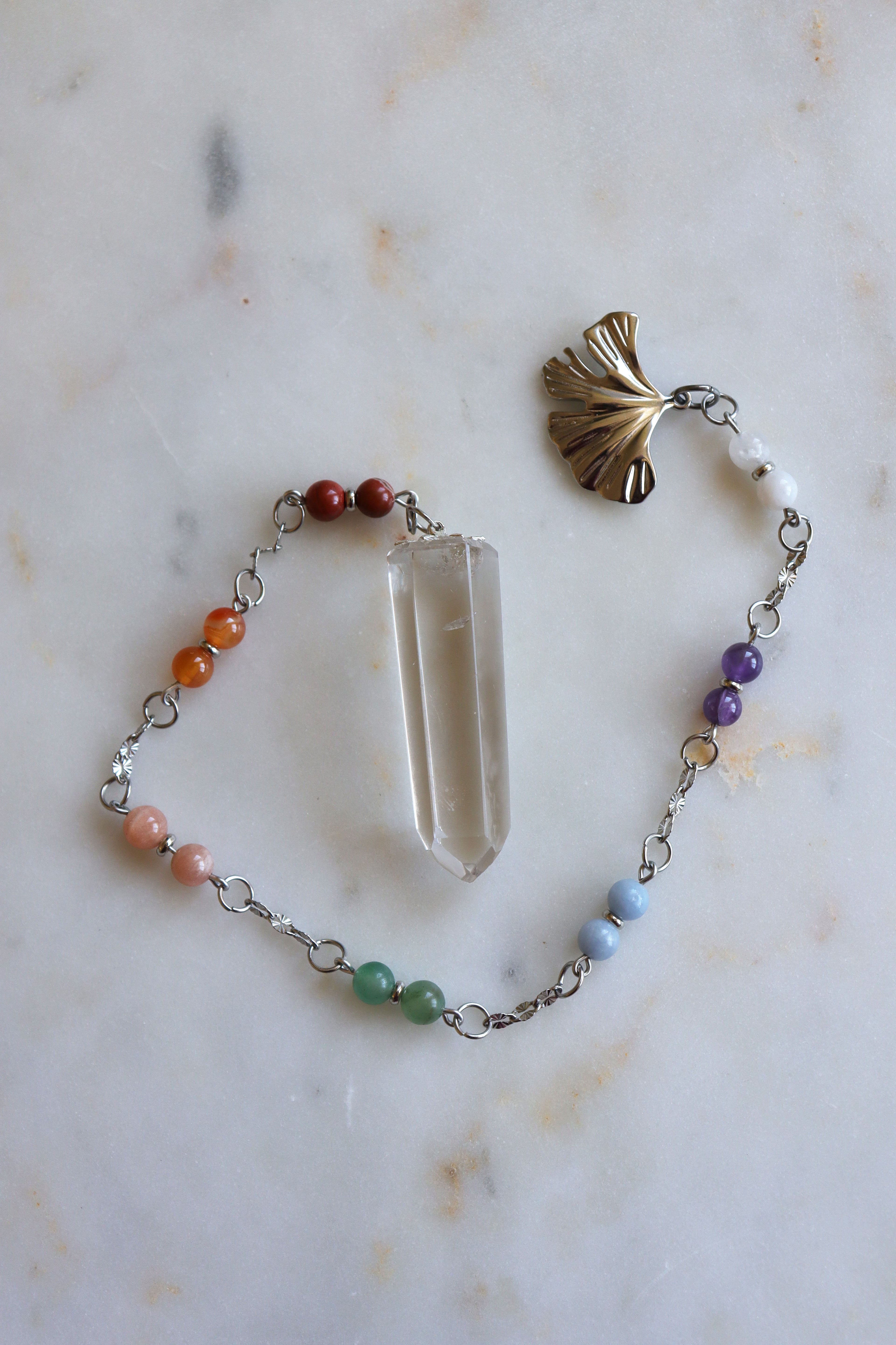 7 Chakra Crystal Pendulum – Clear Quartz Point, Ginkgo Charm, Spiritual Divination Tool
