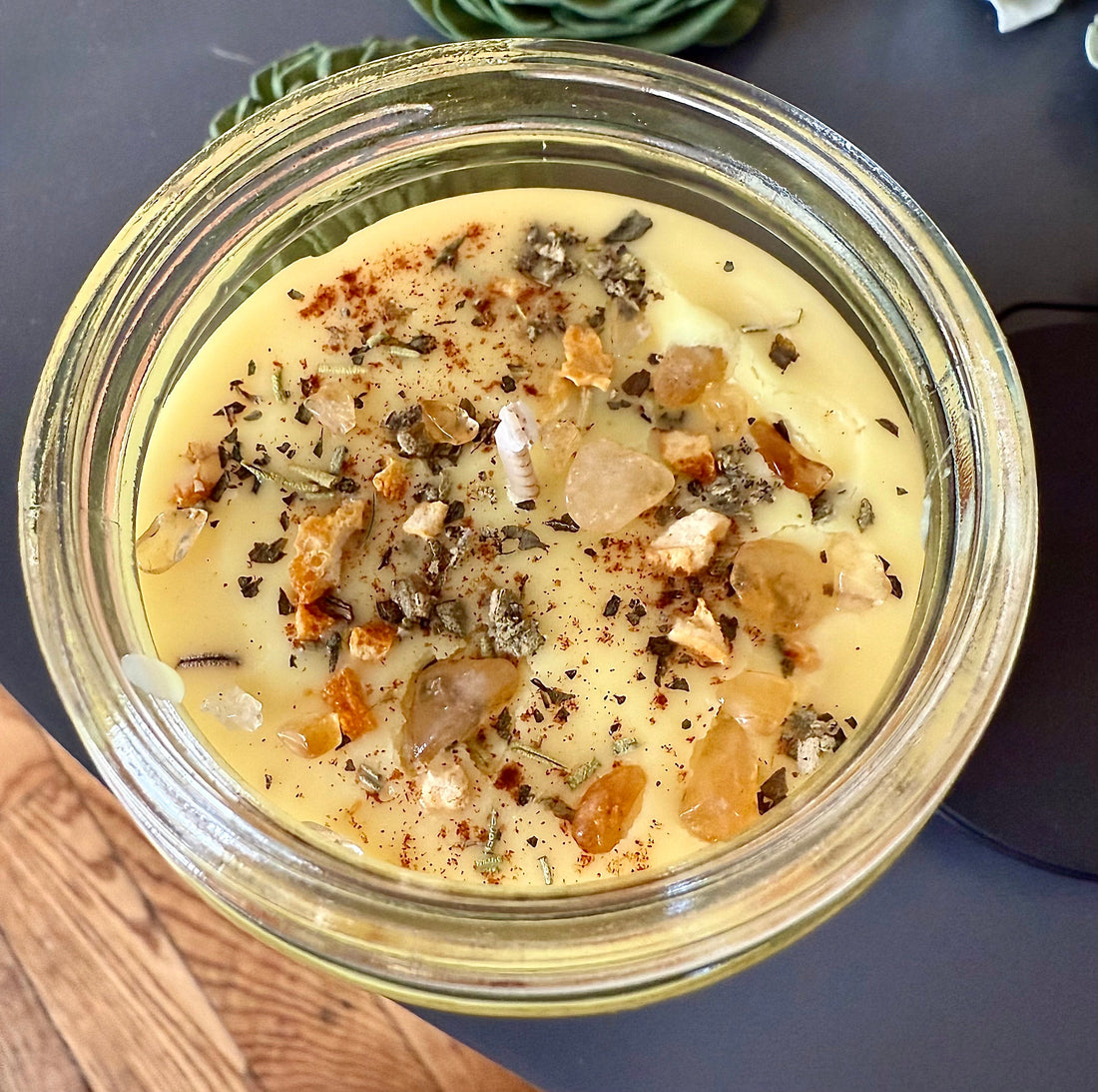 Nag Champa Blessing Candle with Herbs and Crystals.