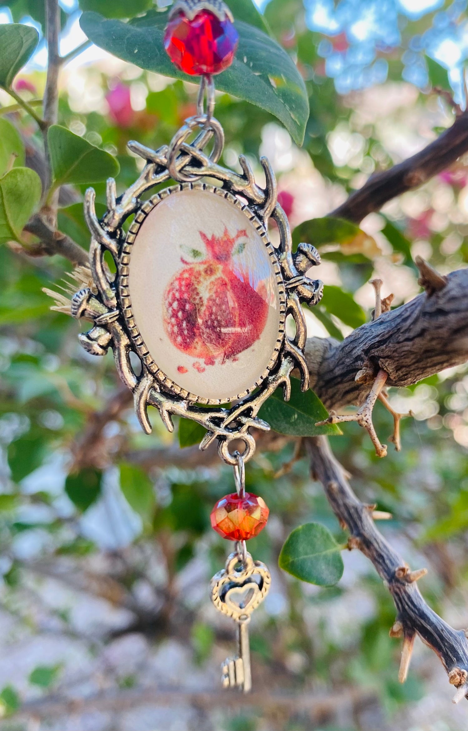 Pomegranate protection and passion charm