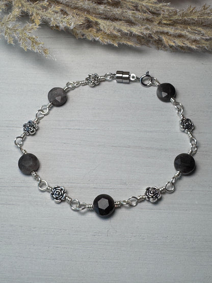 Silver Wire Wrapped Bracelet with Silver Obsidian Gemstones and flower charms.