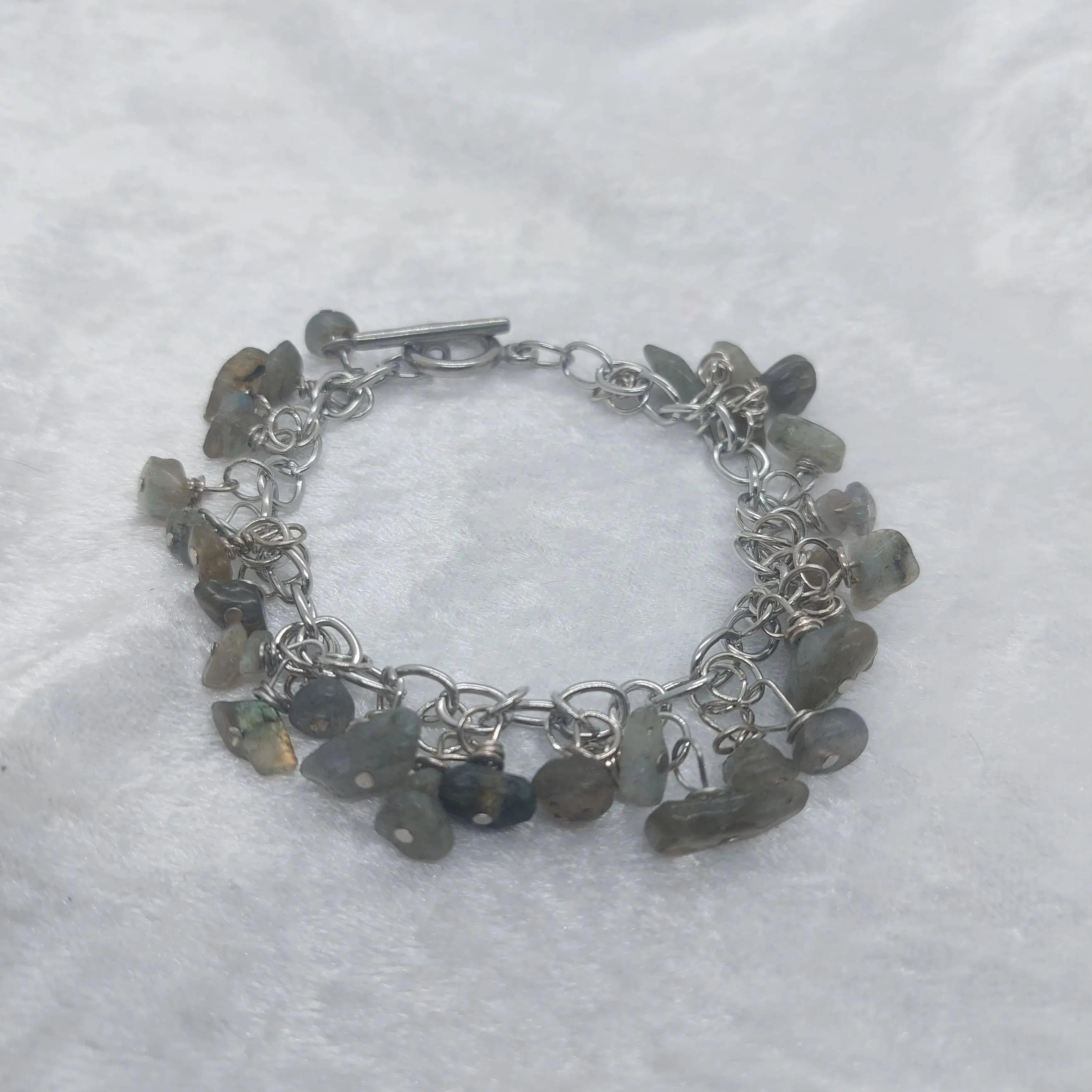 Labradorite chip bracelet with iridescent gray stones on a silver chain and toggle clasp.