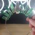 Moss agate crystal crown on a silver headband with silver wire, featuring a central Celtic knot design.