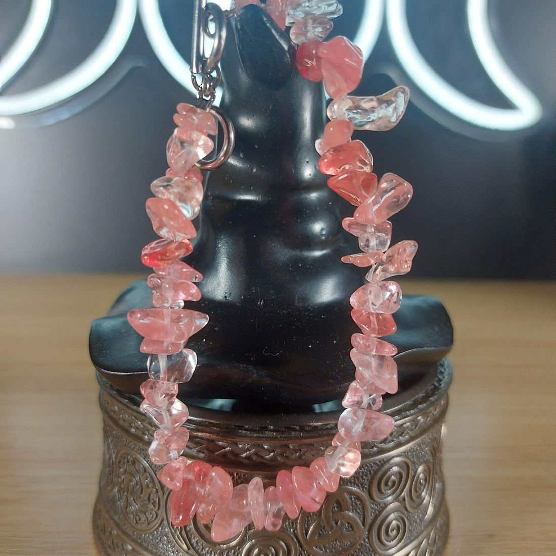Pink strawberry quartz crystal chip bracelet with a silver stainless steel toggle clasp.