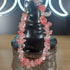 Pink strawberry quartz crystal chip bracelet with a silver stainless steel toggle clasp.