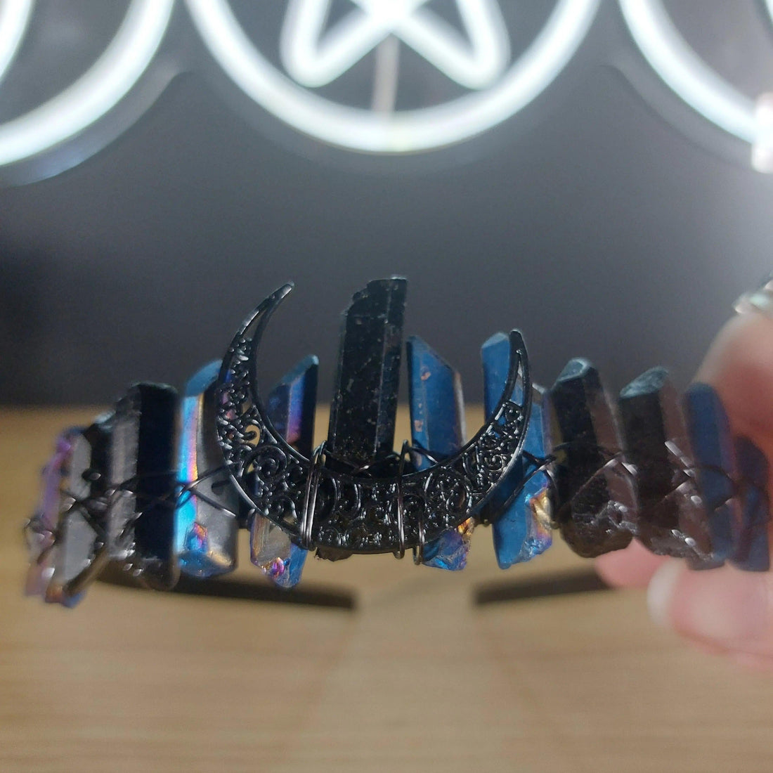 Black and blue treated quartz crystal crown headband with crescent moon accents, wrapped in dark wire.