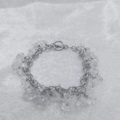 Clear quartz chip bracelet on a stainless steel chain, approximately 8 inches long.