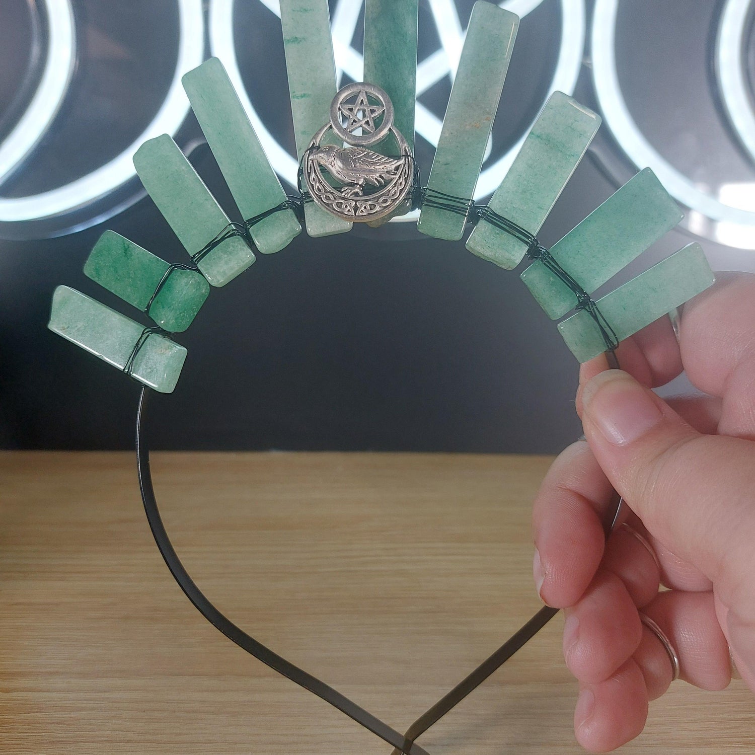 Green aventurine crystal crown headband with black wire and a silver pentagram charm.