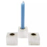 Set of three natural selenite crystal chime candle holders arranged together, showing white fibrous selenite with cylindrical tops sized for chime candles
